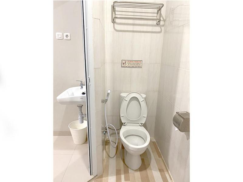 Oyo 2816 Privato Suite Kembaran Экстерьер фото